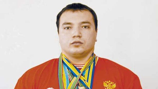 Чемпион мира по пауэрлифтингу Андрей Драчев